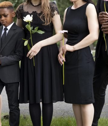 family-visiting-grave-loved-one(1)