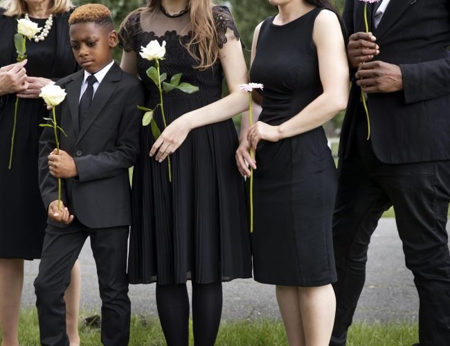 family-visiting-grave-loved-one(1)